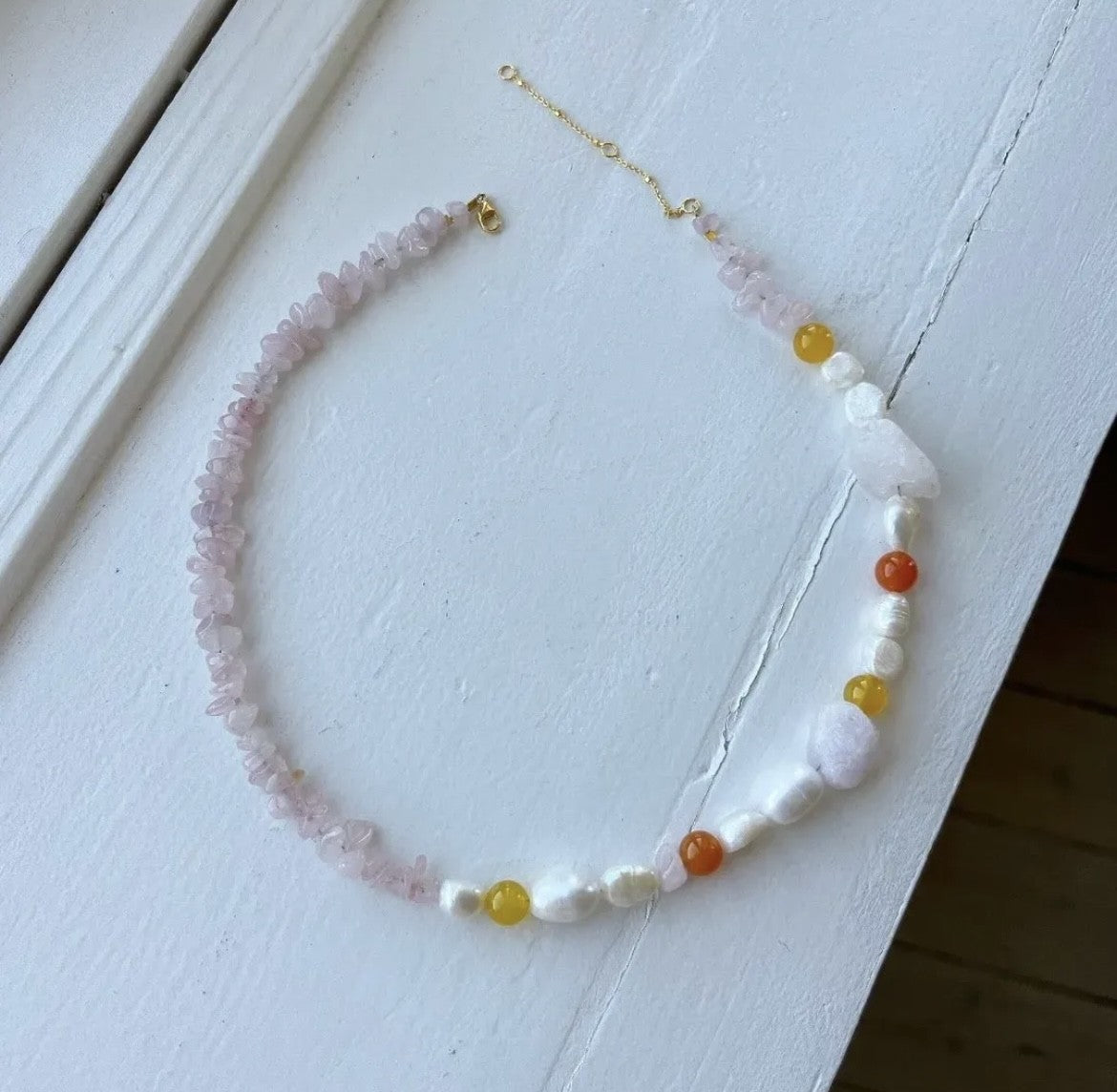 Necklace with freshwater pearls, stones, and crystals