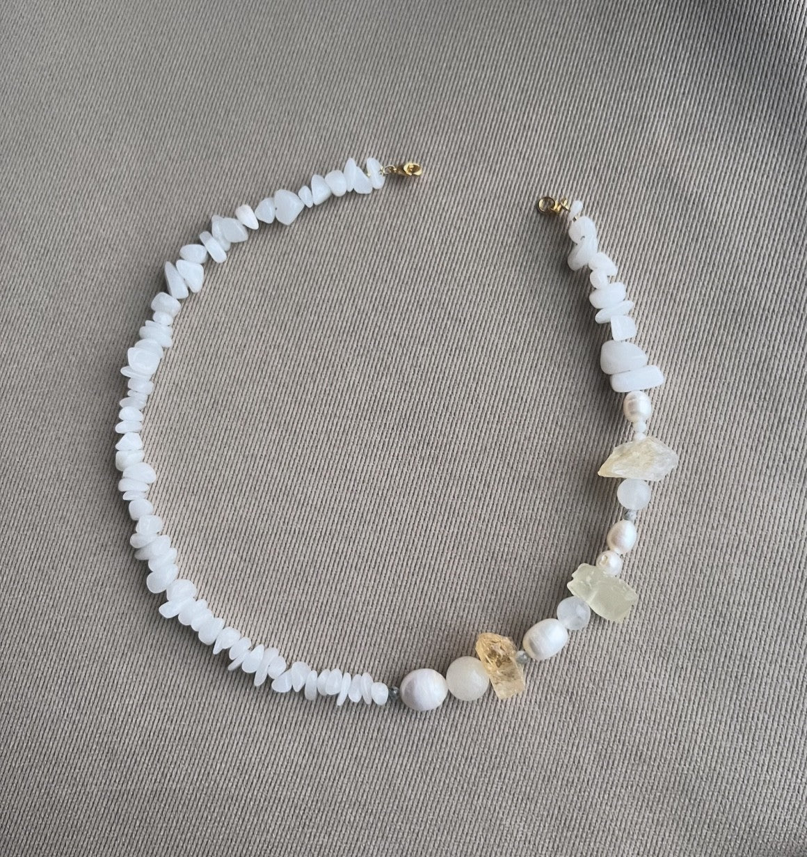 Necklace with freshwater pearls, stones, and crystals