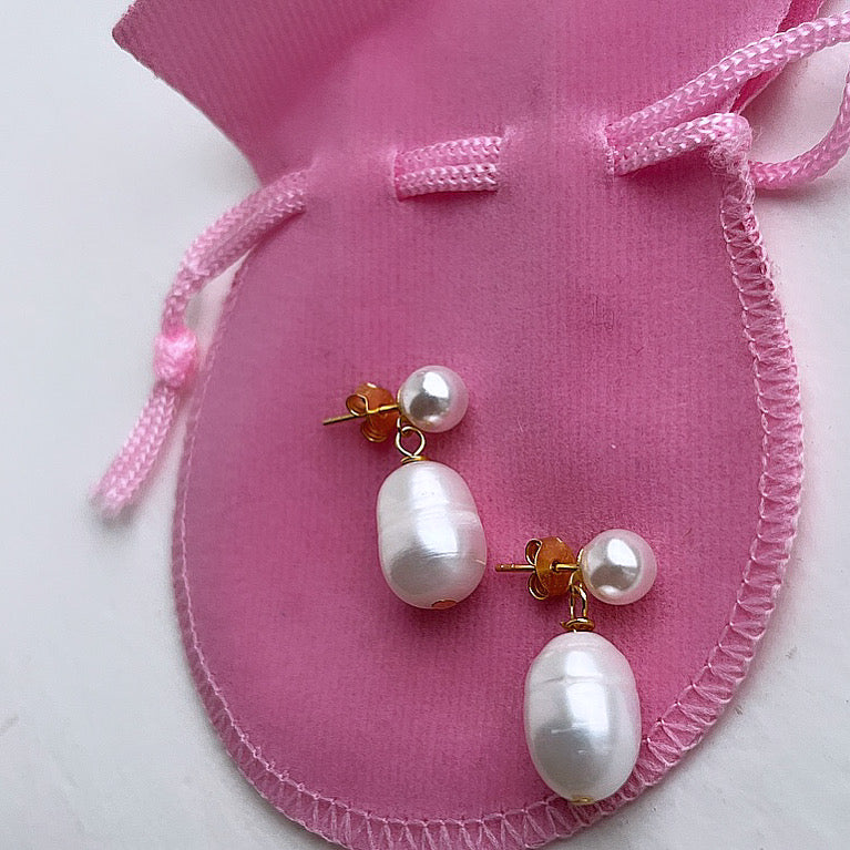 Stud earrings with large freshwater pearls