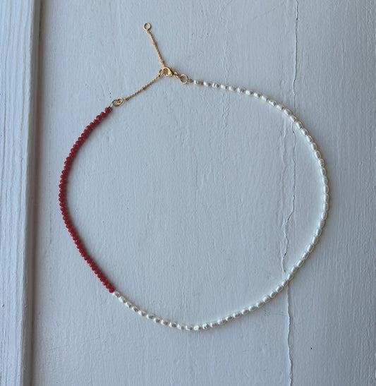Necklace with small freshwater pearls and red glass beads